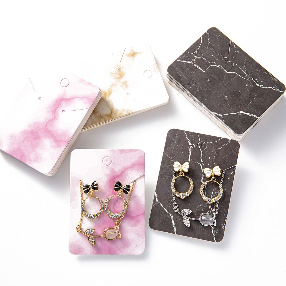 Body Jewelry Display - 50 szt. Marmurowy stojak na kolczyki